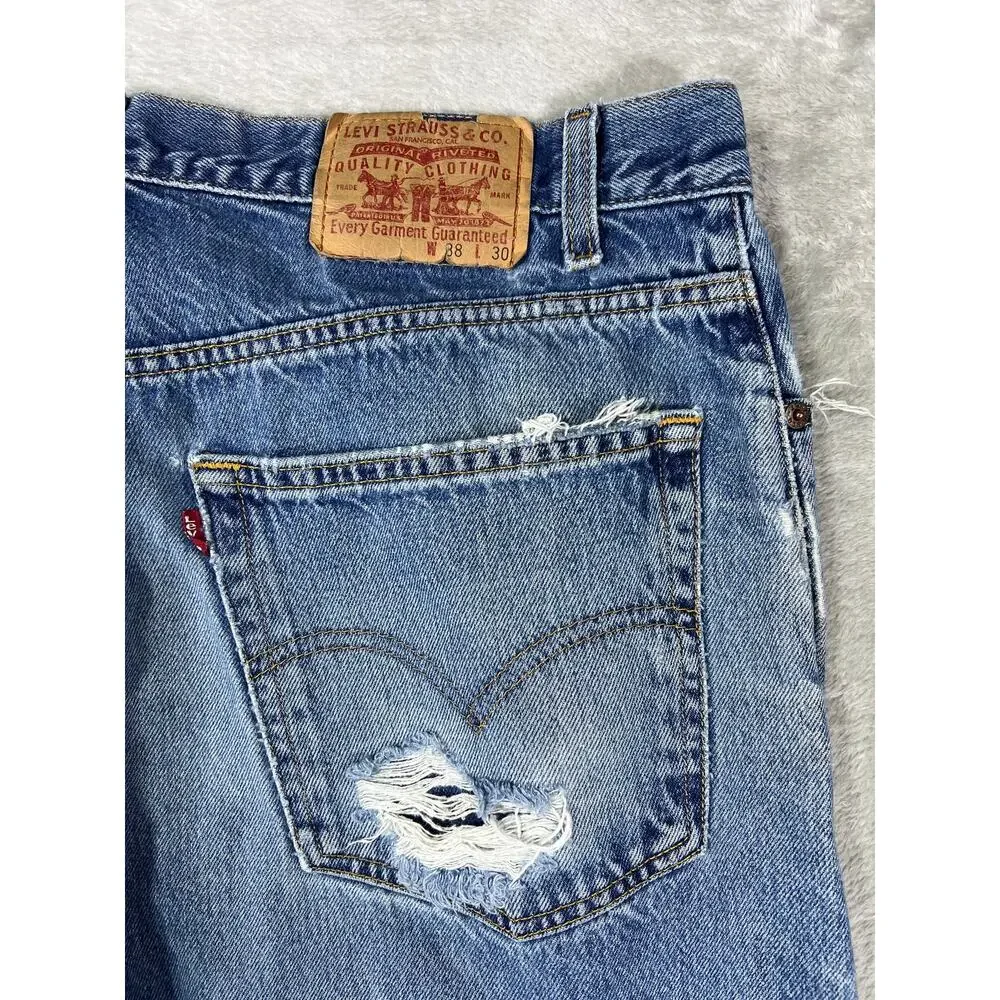 Vintage Levi's 550 Distressed Jeans 38x30 Made in USA Light Wash